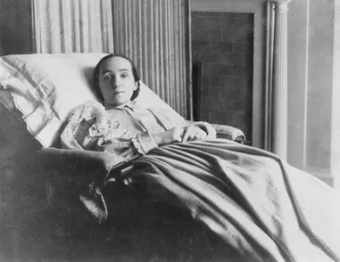 Historic photo of a Merrick community member seated in a chair