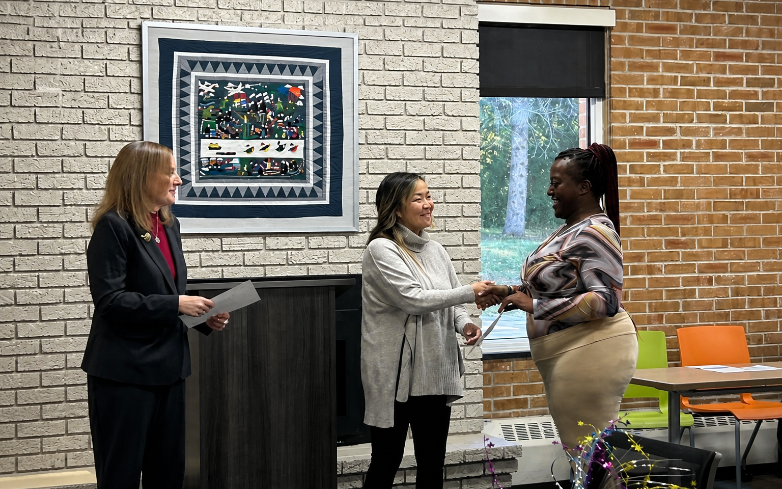 A Merrick participant being recognized during an Employment and Career Services gathering